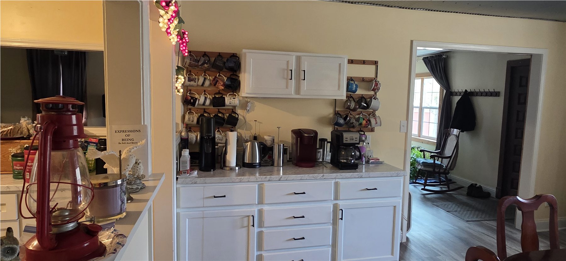 Kitchen storage and dining-room view